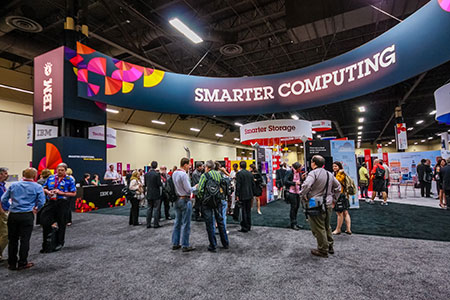Custom trade show banners on display at an exhibition booth, featuring bold branding and vibrant, high-res graphics.