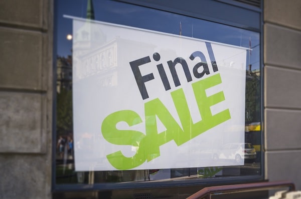 Custom banner sign promoting a business, bold colors and clear lettering to attract customers