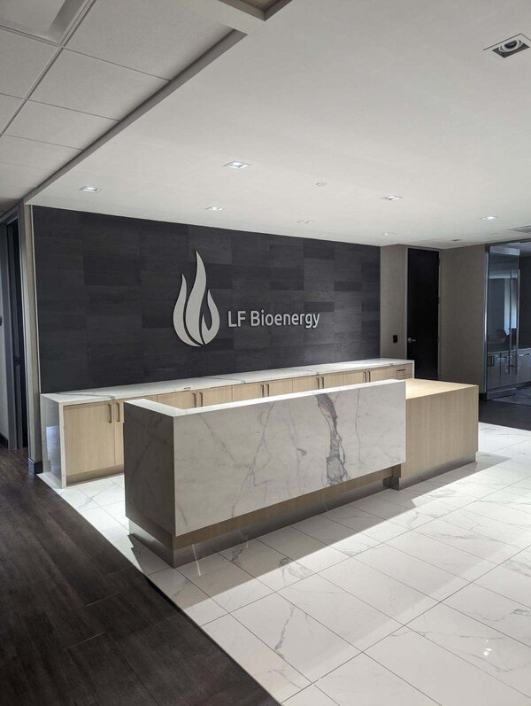 LF Bioenergy office lobby sign mounted on the reception wall, showcasing professional indoor brand presence.