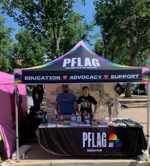 PFLAG trade show booth design featuring branded backdrop, banners, and display elements for event marketing.
