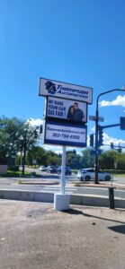 Thompson Automotive exterior commercial sign after redesign by Mtn High Sign Design