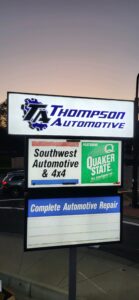 Thompson Automotive storefront before installation of custom lighted building signs; exterior facade shown