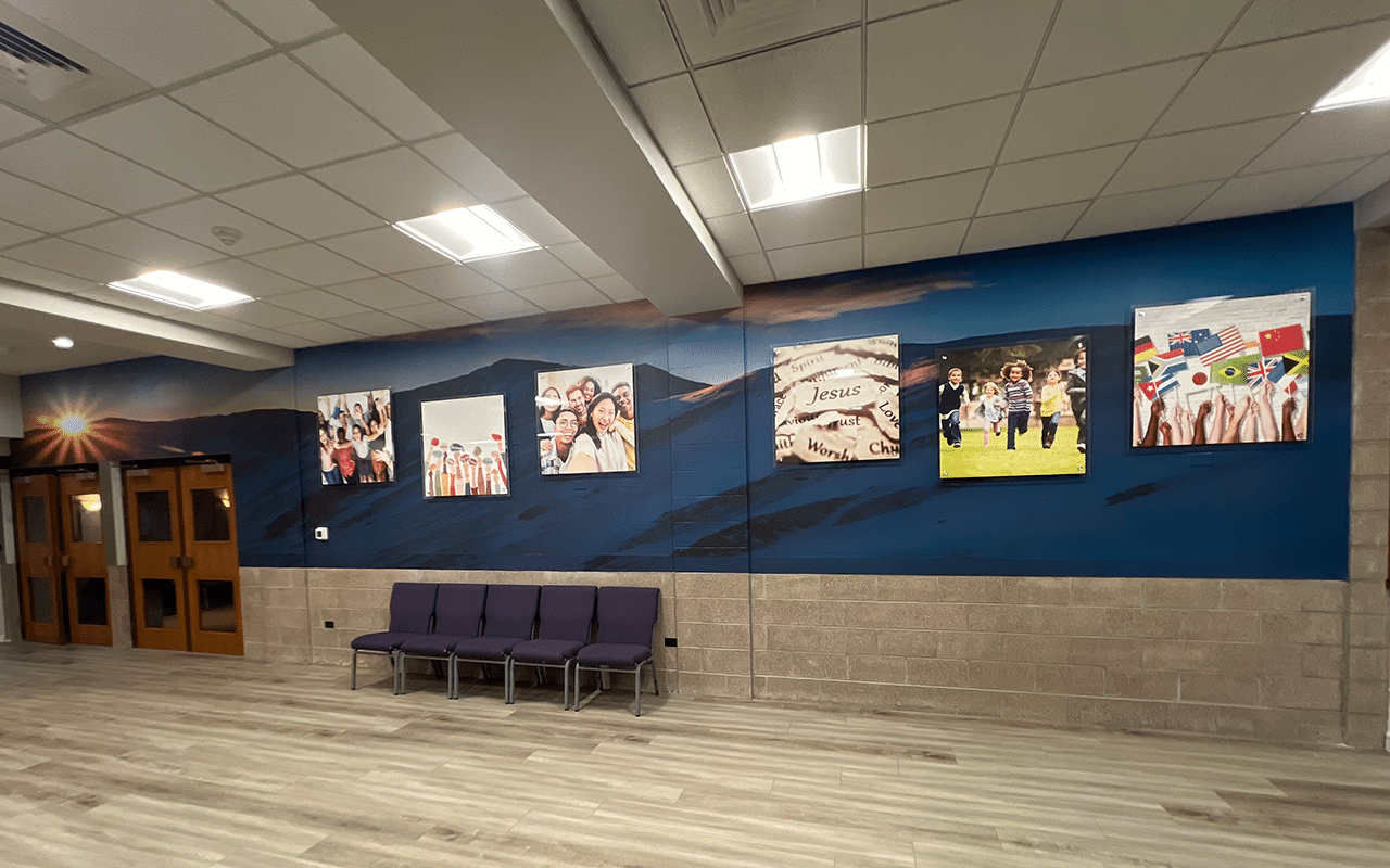 New Life lobby wall sign in a modern reception area, a polished indoor sign that reinforces brand presence