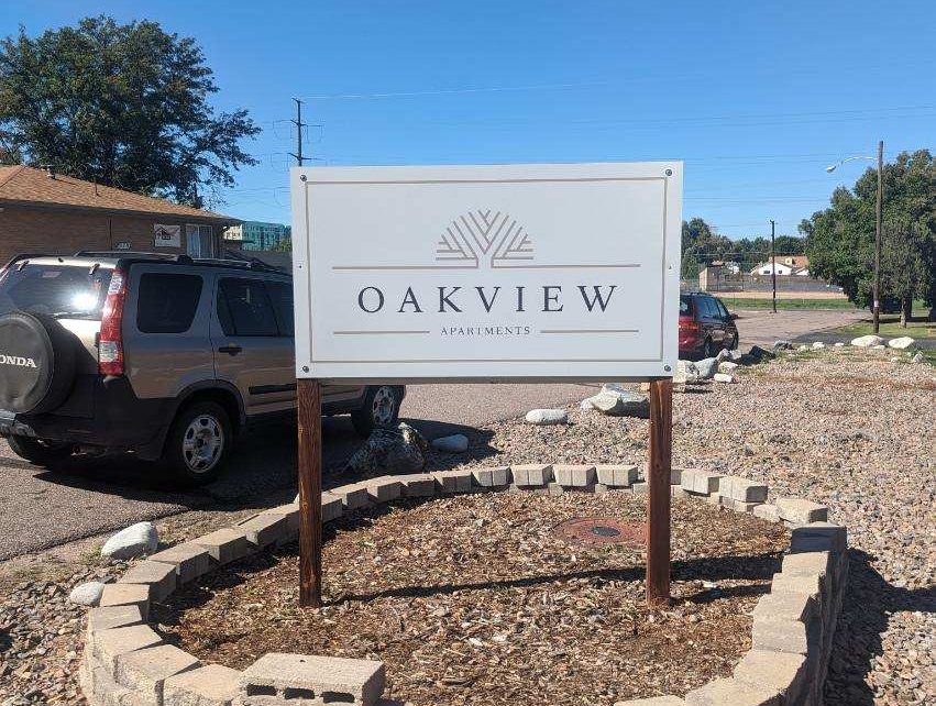 Oakview property entrance sign highlighting custom branding for a multi-family housing community