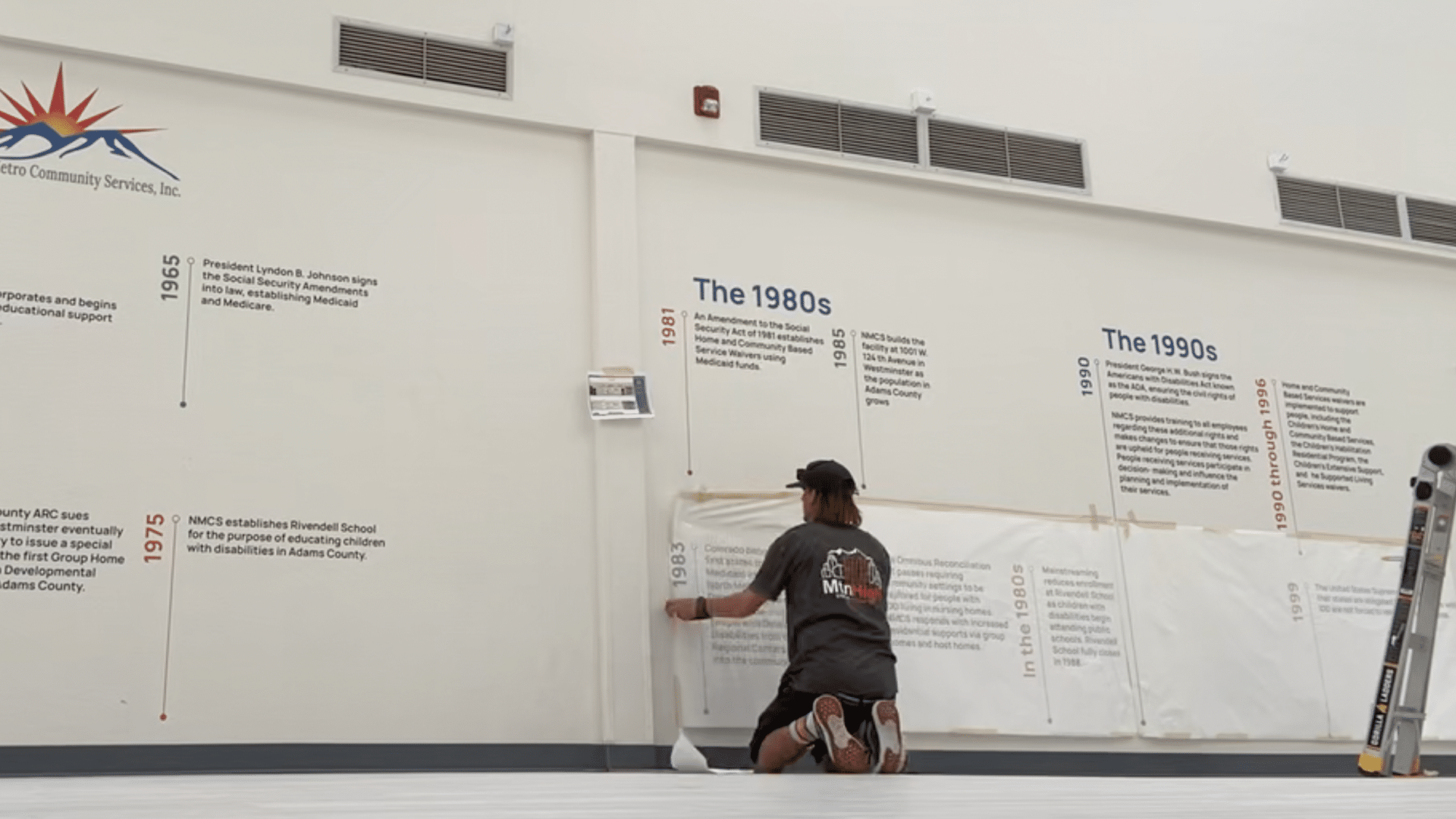 Technician installing a storefront sign, illustrating top installation mistakes and how to avoid them