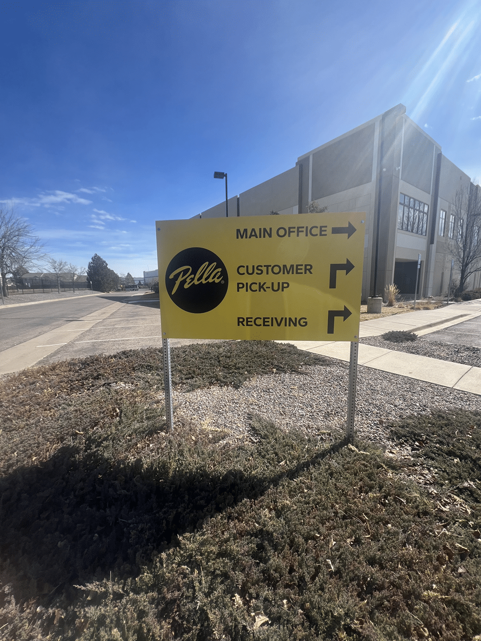 Professional wayfinding signage directing employees and visitors to departments within a large facility.