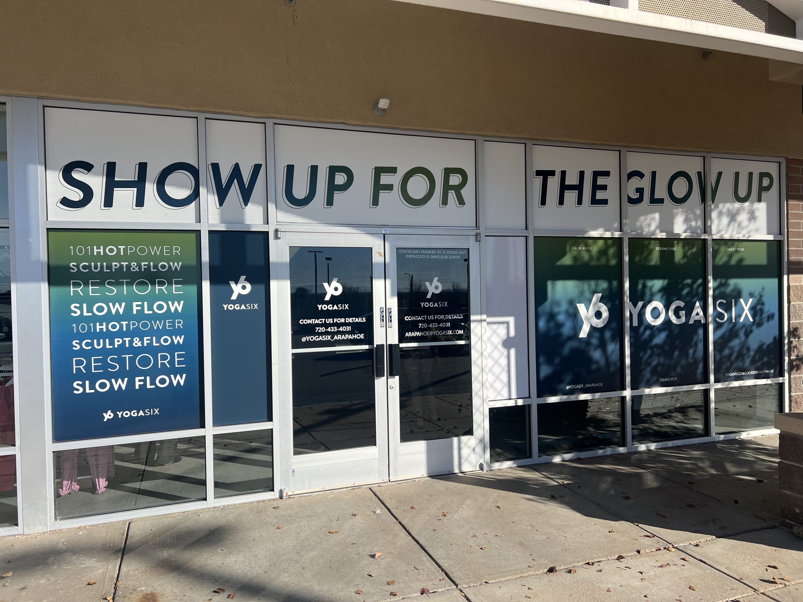 Frosted privacy vinyl on office glass partitions at Yoga Six, enhancing workspace privacy
